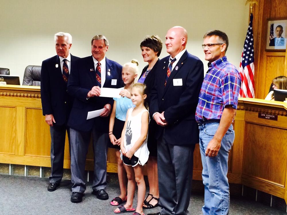 Officers formally present the $2,000 ENF Beacon Grant to the city of Pleasant Hill.