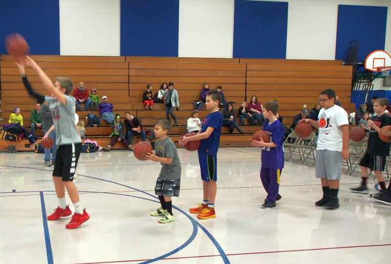 Boys warming up the Youth Hoop Shoot Event