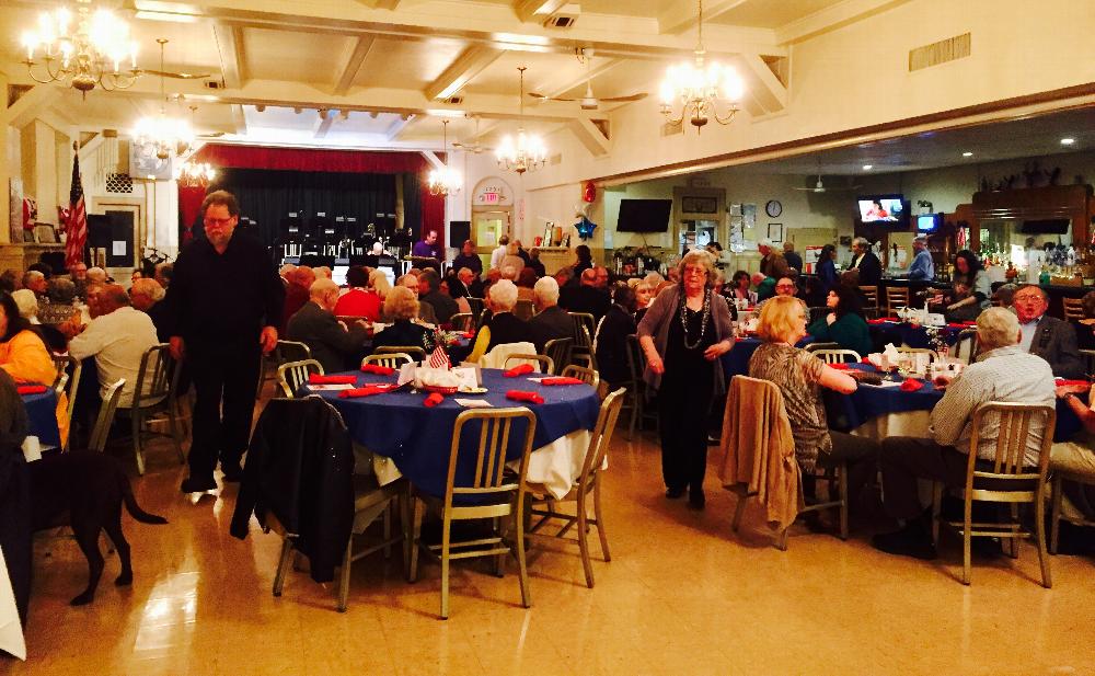 Social hall full of Veterans and their guests.