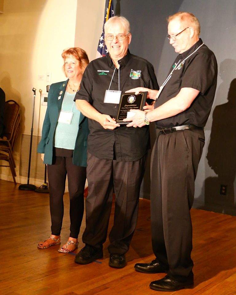 PER Randi Kobernick receiving the award for 1st place in the recent 11th Hour Toast contest.  

Pictured (l-r) Cathy Swanson, OSEA Ritual Chairperson; PER Randi Kobernick; OSEA President Rick Shipley