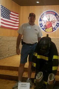 Lecturing Knight Randy Sterling a retired firefighter set up a memorial on 9/11 to remember all those who lost their life's on 9/11/ 2001. Not pictured was the flag that Randy displayed made with the names of all who died that day 16 years ago.