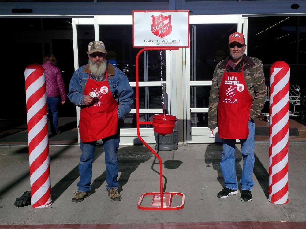 ER Jim and Inner Guard Chris ringing the bell for the Salvation Army