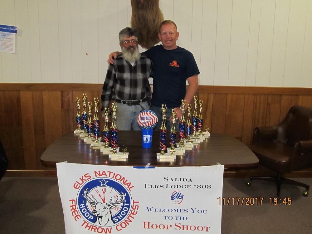 ER Jim DeLuca and State Hoop Shoot chair Brandon Wilkins with local shoot trophies