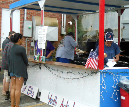 During Bath's "Heritage Days", the Youth Activities booth offers grilled burgers, hot dogs and sausages as a fund raising activity.