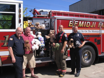Leading Knight Candace West rounded up Teddy Bears from Bemidji Elk members during the July dinner. These bears were donated to the Bemidji Fire Dept. The bears are used to give to children during times of stress.