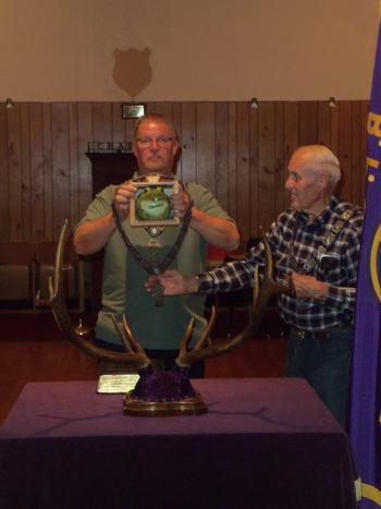 Newest Member Corn Dog Bucktooth the Frog being installed as Assistant Leading Knight by Marv Worden, with Acting Leading Knight & Trustee Jon Hallquist. Sept. 19, 2013