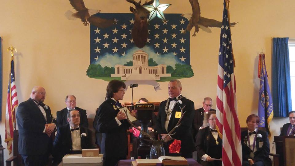 Trustee Gary Mayberry receiving the "Order of the Golden Wrench"