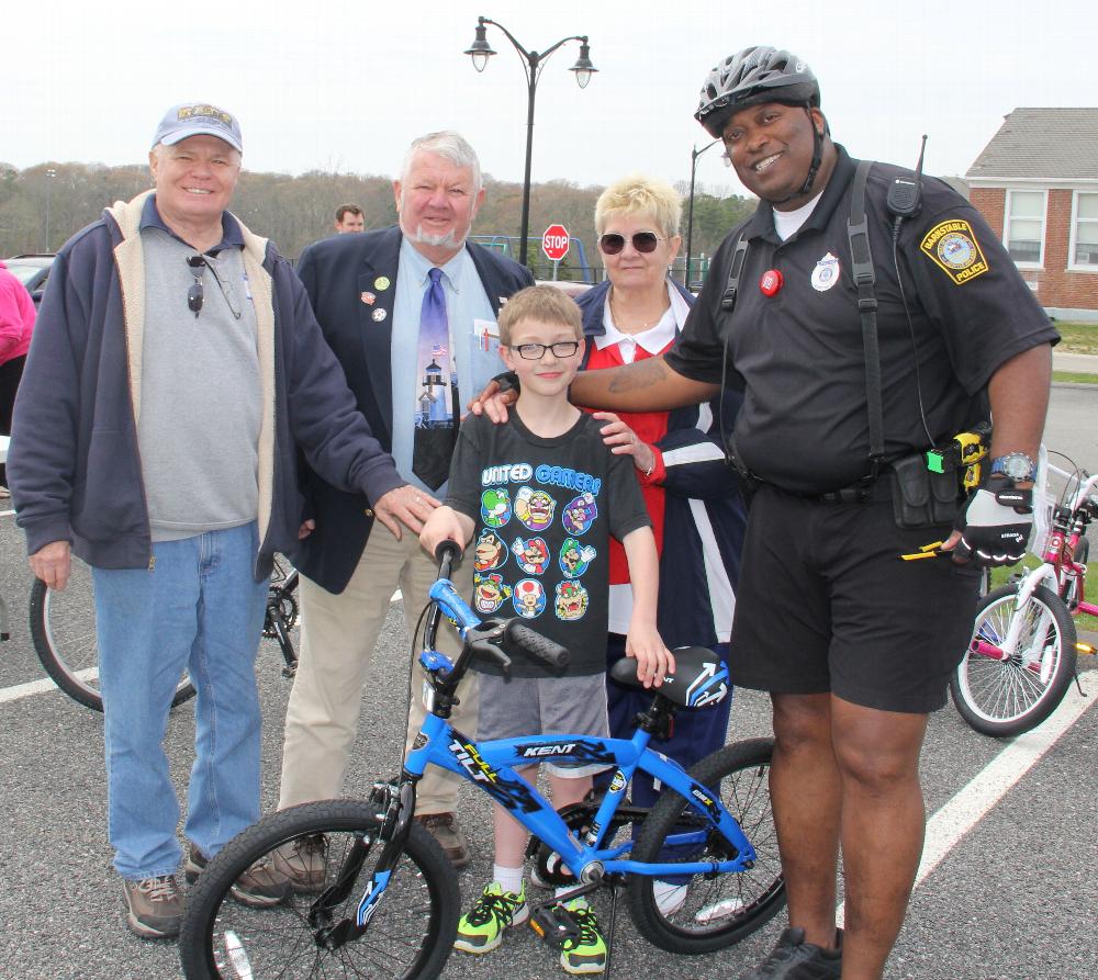 From L to R: ER Dave Dunbar, Trustee Dave Ganshaw,Treasurer Betty Legere, Officer Brian Morrison, Barnstable Police Department, with one of our lucky winners, Richard Hurley 