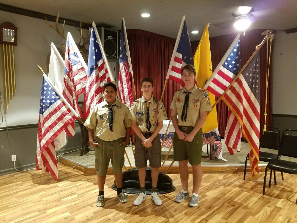 Troop 50 Scouts help with the Flag Day ceremony