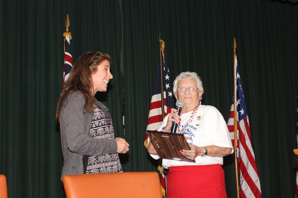 Julie Witherby, widow of former Lodge Veterans Chairman Cliff Witherby, presenting plaque to Michelle Ritter for her past seven years as Veterans Sevice Chairperson. 