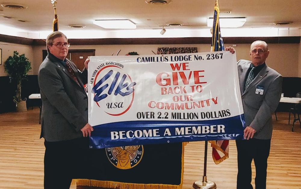 December 9, 2019
State Vice President Bob Culican and DDGER Ray Caplin present a banner acknowledging  the Camillus Elks Lodge for given back more than $2.2 million to the community. Also, our Lodge was recognized for have a deliquency rate of 1.2% - the lowest in the state.