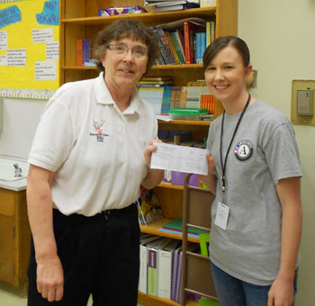 Leading Knight presents Amy Reed of Joseph Gale Elementary with check for $572.00 for Backpack Nutrition program.