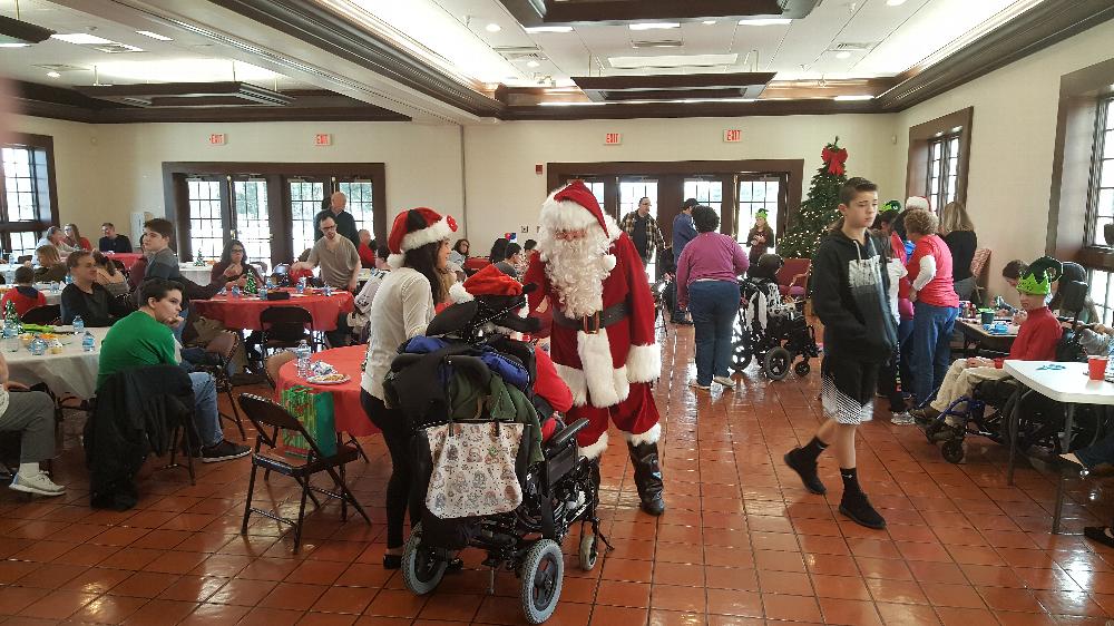 Santa visiting our special children at the Christmas party on 12-4-16