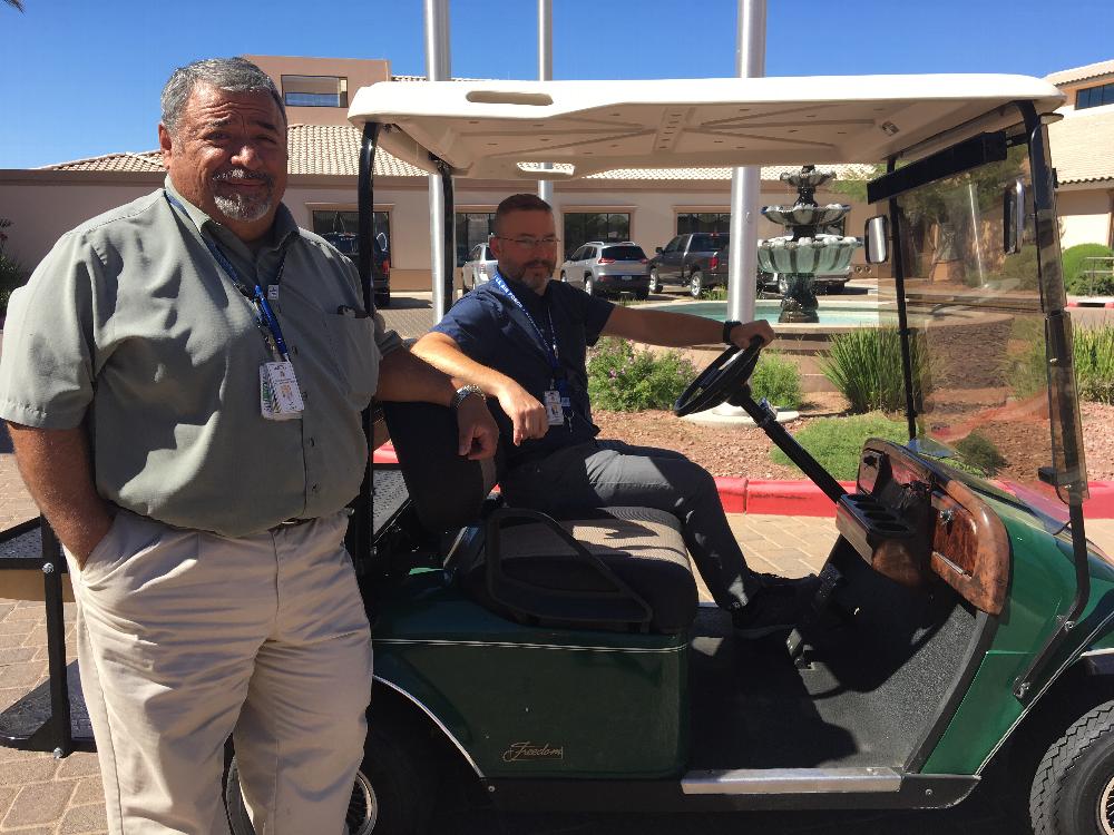 Sam Nanez and Ed Lloyd try out transportation golf cart donated by Tucson East to the Arizona State Veteran Home-Tucson.