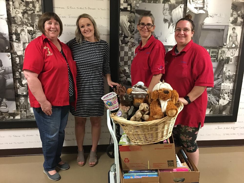 Donations of books and stuffed animals to the  UA Steele Children's Research Center.