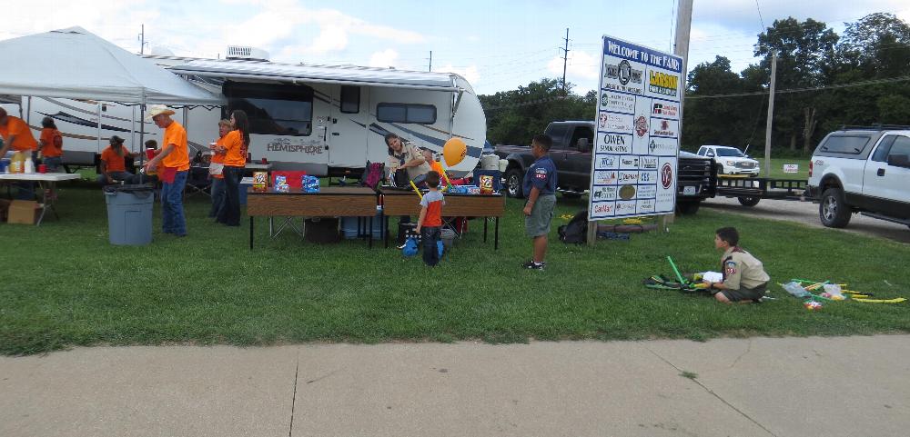Our Scout troupe #2557 setting up their booth.