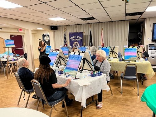 Painting party held at the lodge.  The ladies painted a island scene on tote bags.  