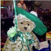 This is our Lounge mascott Soldier Bear he sings God Bless the USA when you press his hand. Here he is decorated for Saint Patrick's Day. Thank You Butch and Barbara Ward we Love him. 