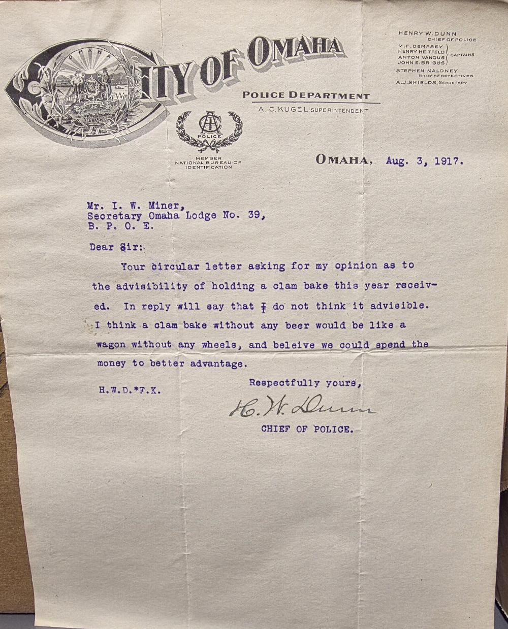 After the Omaha Elks Lodge Secretary sent letters about the 7th Annual Clambake—and the challenges posed by the new “bone dry law” banning beer—this reply arrived from the Omaha Police Chief. In it, he advises against holding the event, famously remarking that “a clam bake without any beer would be like a wagon without any wheels.”