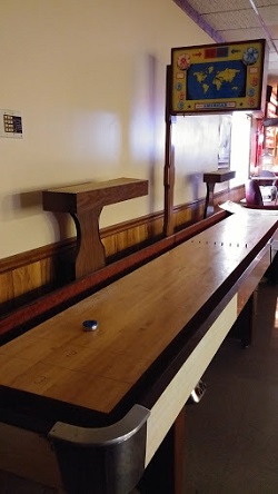 A beautiful shuffle board is in the Grill near the pool table!