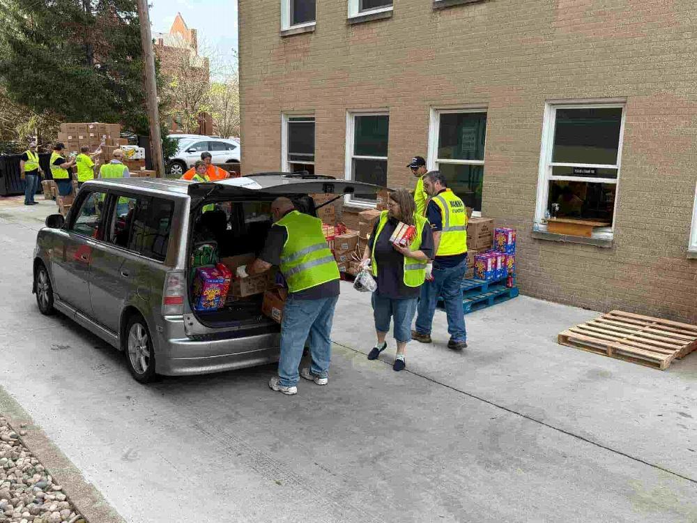 Passing out food at Manna from Seven on Good Friday