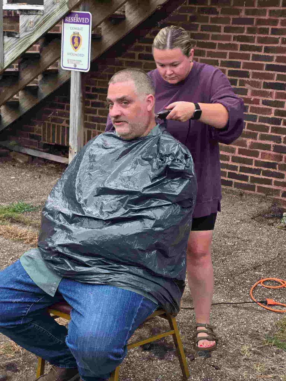 Dave getting "the cut" by an Elk beautician.