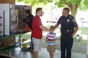 ER Eric thanking one of our Hometown Heroes for his service