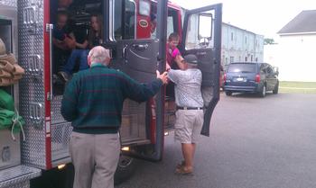 Bay City Elks helping some of our special children go for a fire truck ride at our 2013 Special Needs Children Picnic