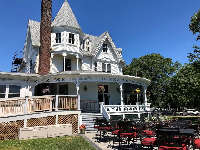 Lodge 104 with new patio, lawn furniture, and handicap access ramp installed 2022.