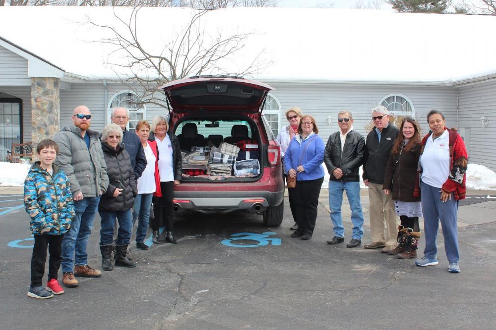 Blankets and bedding were delivered to the Mother Susan Anderson House in Saratoga Springs with the Beacon Grant funds.

Pictured in Photo 1: Two family members of Nancy Douglas, Lodge Members: Marge Mohrmann, Gary Wilcox, Jean Brunelle, Exalted Ruler-Gerry Conboy, Lillian Miles, Roxane Major, Bill Harbourne, Dave Waghorn, Nancy Douglas and Dora Lee Stanley.