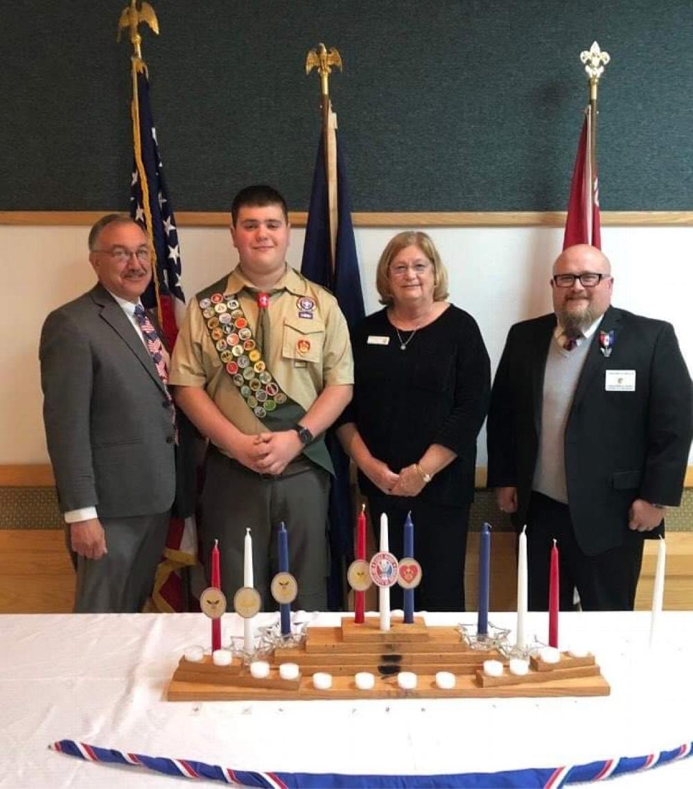 An Elks Eagle Scout award and flag was presented at the Court of Honor Eagle Scout Ceremony to Eagle Scout Nahan James Knepper. Pictured, Mary Jane Stupi (Tiler), Jonathan Perry (Lecturing Knight), Stephen Pappas (Exalted Ruler)
