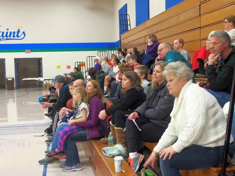 Parents supporting their children during our Annual Youth Hoop Shoot Event. 