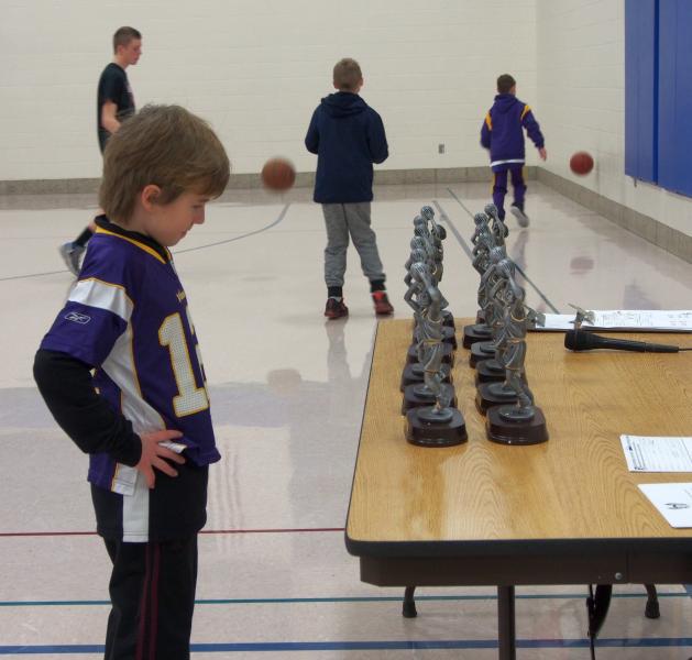 Checking out the boys and girls trophies awarded at the Stillwater Youth Hoop Shoot Event. 