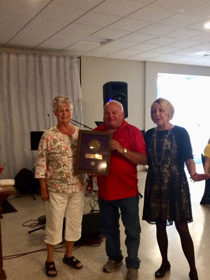 Member Celebration 2018. Presentation of seal and coin removed from original bar when Lodge was renovated. Pat Adriance, Dennis Rickett, ER Kristie Durgin