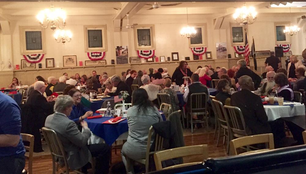 Social hall full of Veterans and guests.