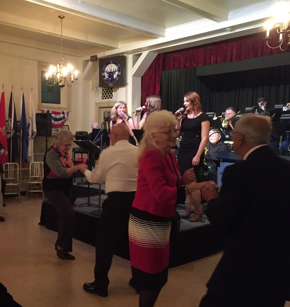 The couple dancing on the right ... he is 91 years young and a WWII Veteran. They danced all night!
