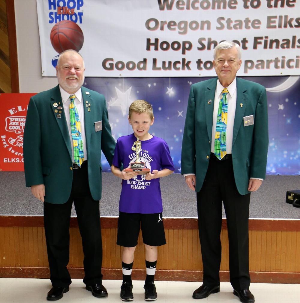 OSEA Hoopshoot Contest<br> Front row: OSEA President Carl Lino, Laini Dahlin, SW District VP Herm Blum, & SW District Hoopshoot chairman Joel Buoy<br> Background: OSEA Hoopshoot Chairman Skip Caldwell