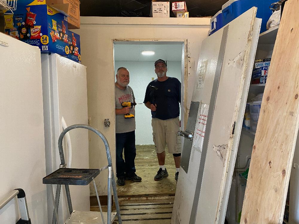 Steve & Joel installing panelling