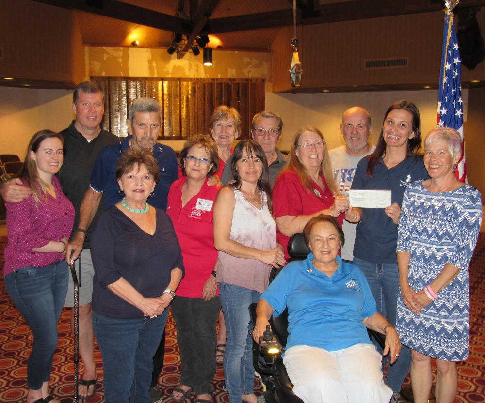 On May 6th The Phoenix Elks Lodge Donated a check for $1,000 and a power Chair to the Arizona Chapter of the Paralyzed Veterans of America