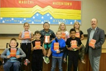 Recently the Uniontown Elks #370 presented dictionaries to 3rd and 4th grade students of A.L. Wilson, Smithfield and Masontown Elementary schools.  Three hundred books were distributed to the excited students after a short presentation.    The goal of this program is to assist all students in becoming good writers, active readers, creative thinkers, and resourceful learners by providing them with their own personal dictionary.  The dictionaries are a gift to each student to use at school and at home for years to come.  Uniontown Elks have been sponsors of this program for several years.  All faculty and students are very grateful.

PICTURE:  Students of Masontown Elementary grin from ear to ear after receiving their dictionaries. Pictured from left to right:  Jacob Riggle, Maeghan Chance, Riley Rhodes, Darrius Darnell, Dane Cumer, Tatum Hettenschuller, Jason Jackson, Alana Hetterschuller, and Keith Hilling, Elks representative.

 PICTURE:  3rd and 4th grade student at A.L. Wilson raise their new dictionaries and say “Thank You”.
