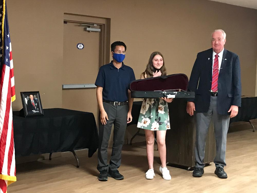 For Youth week, Tucson Elks Lodge #385 on behalf of Harry's Violins program, donated 4 violins (approximately $2,000) to local senior high school musicians from Flowing Wells and Oro Valley High Schools. 