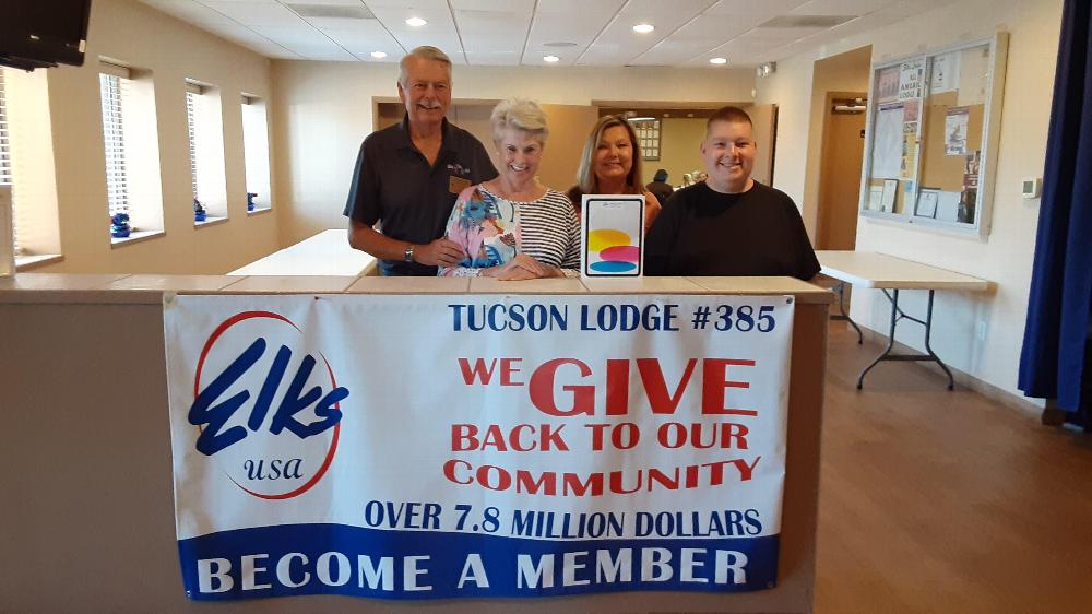 On May 8, 2023, Tucson Elks Lodge once again donated an iPad worth $600.00 to the local branch of the Prader-Willi Syndrome Association National Convention silent auction.
Pictured donation of iPad:  ER Curtis Winters, Lois Wilford, Tammie Penta and her son.