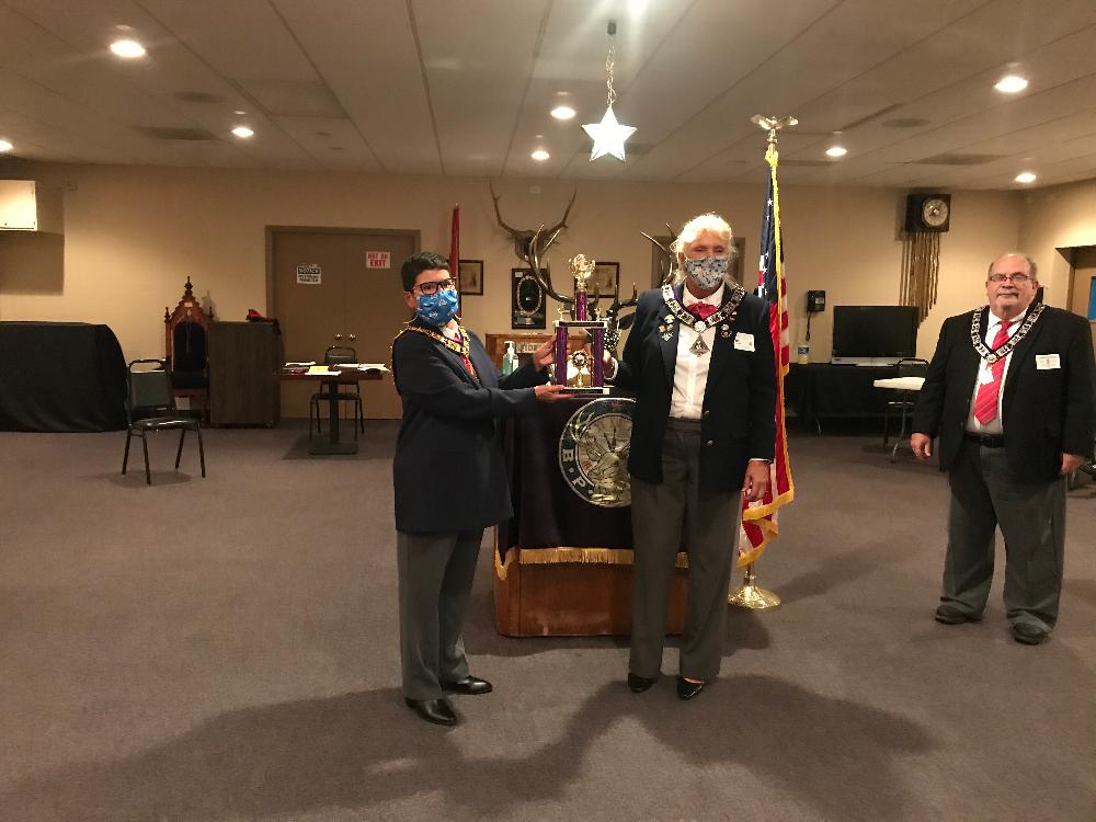 ER M. Lopez and Americanism Chair/Loyal Knight S. Trecartin receiving 1st place Trophy for South District 2019-2020 Americanism Brochure Contest. Sept 8, 2020