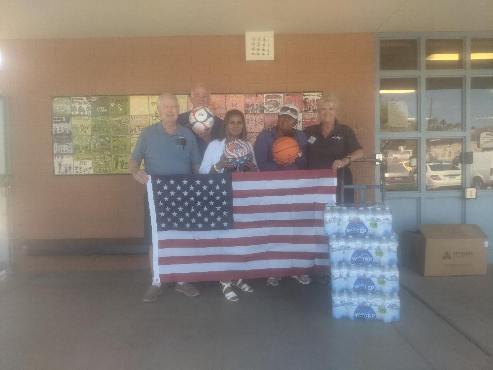 Tucson AZ Elks Lodge #385 donated 24 soccer balls and basketballs to support Physical Education programs at Tucson AZ Nash Elementary School on Wednesday April 20, 2022.  The school was also provided with  160 bottles of water and several American Flags to be used in the classrooms.

Photo Caption Left to Right: Bob Holyoak – ENF Chairman; Wayne Burns – PER; Dr. Laura Esquibel – Nash Elementary Principal; Arianna Jones – PE Coach; Susan Trecartin – Exalted Ruler