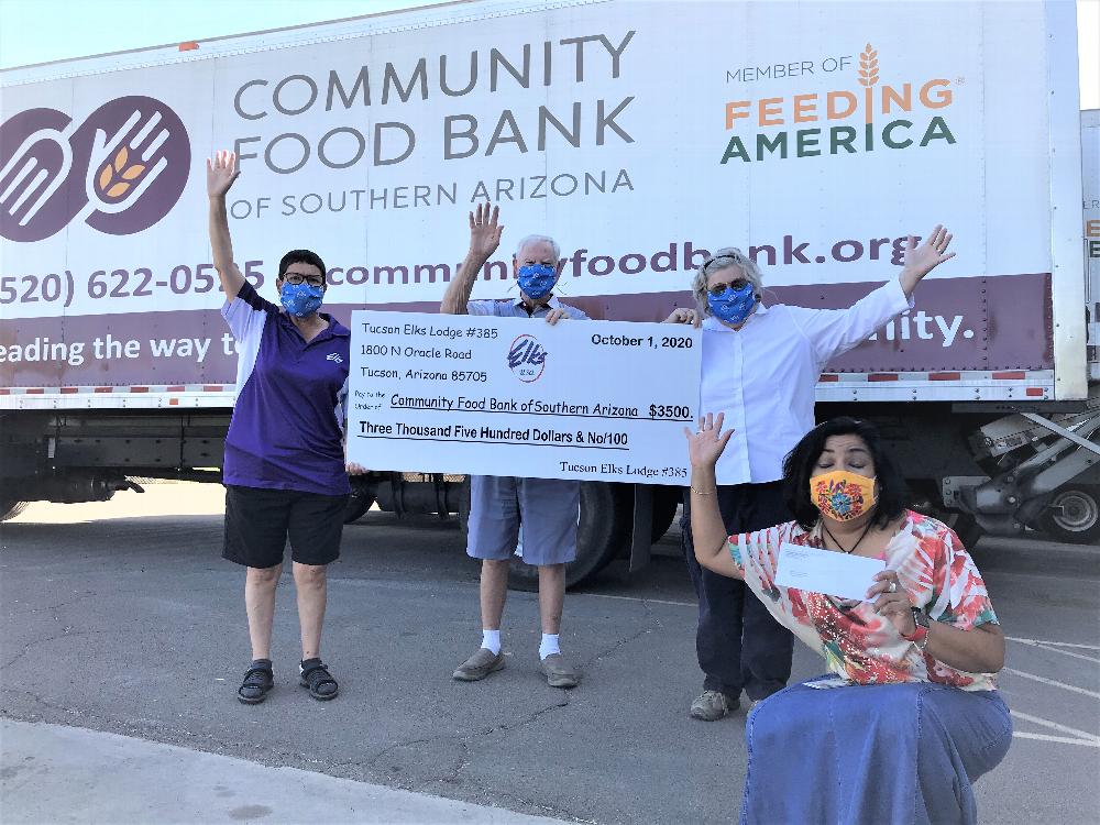Tucson Elks Lodge #385, donates again to the Southern AZ Community Food Bank using the Beacon Grant in the amount of $3,500.  With this donation  Lodge #385 has donated $8,000.00.  Pictured, L-R
ER, M. Lopez, Trustee, B. Holyoak, Treasurer, D. Gnuschke, and SACFBank representative.
S. Castillo Chief Development Officer.  10-16-2020.
