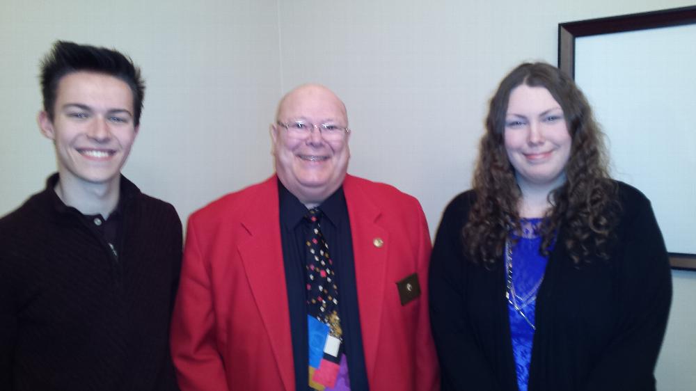 ELKS LODGE #403 SCHOLARSHIP CHAIRPERSON BUD HINAUS AWARED SCHOLARSHIIPS TO THOMAS KROB (LEFT) AND RACHEL TWE (RIGHT) AT RECENT YOUTH RECOGNITION BANQUET