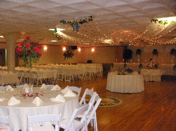 <b><h2>The Banquet Room with rental furniture as decorated for a wedding.</h2></b>