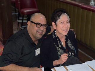 Adolfo and Maria helping out at the Volunteer Appreciation Dinner March 2022.