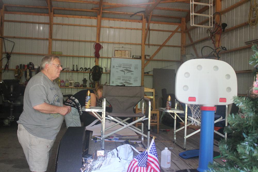 Pete Rogoski and Dr. Tina Lamb working on float 2021.