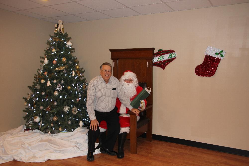 PER George Monville gives Santa his Christmas List.